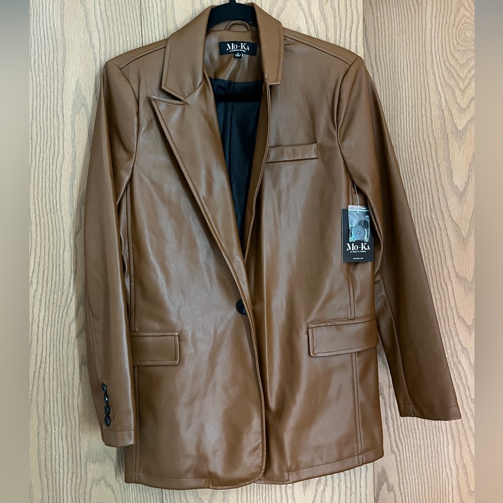 Brown leather jacket. New with tags.